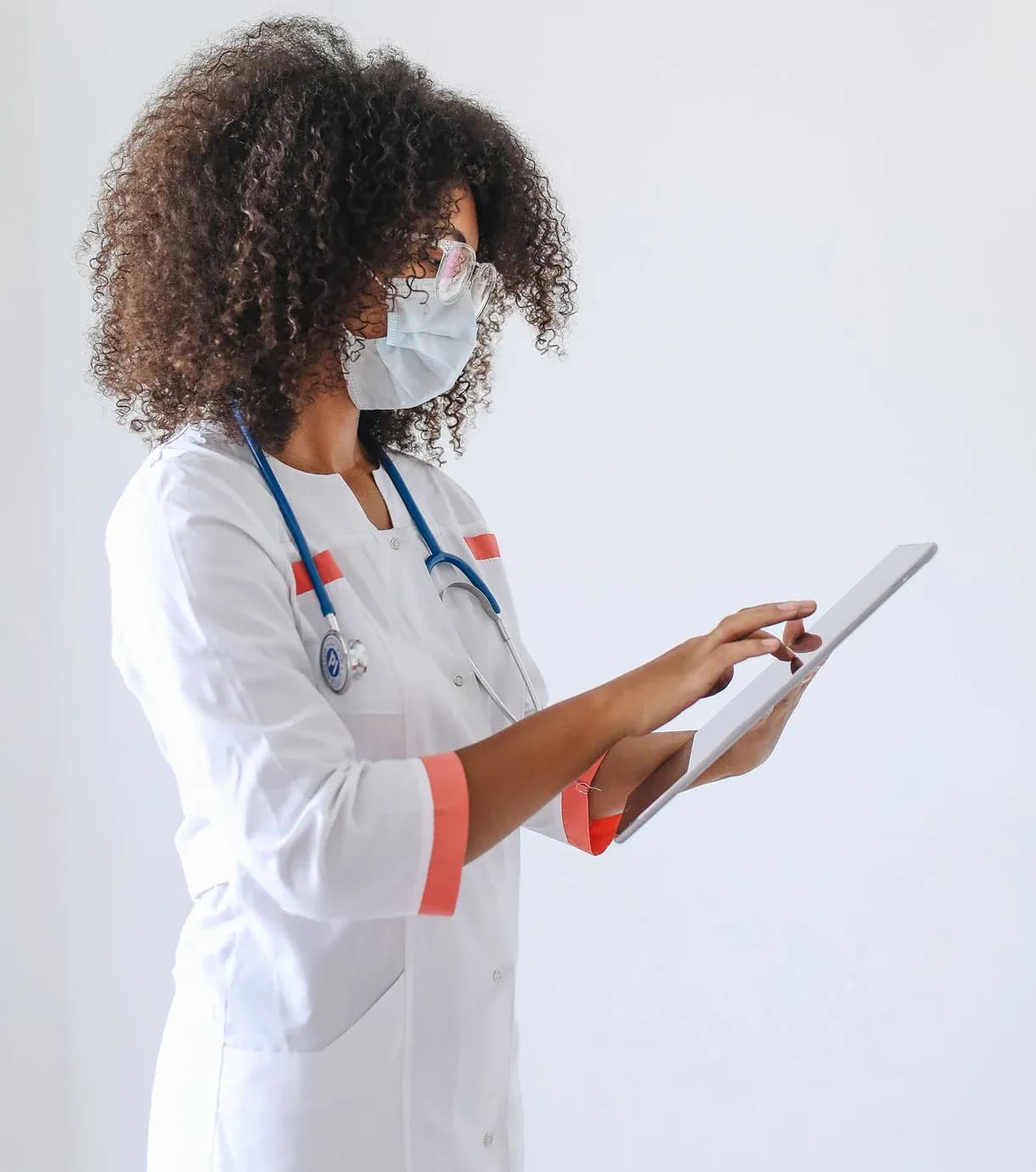 Medical professional using a tablet