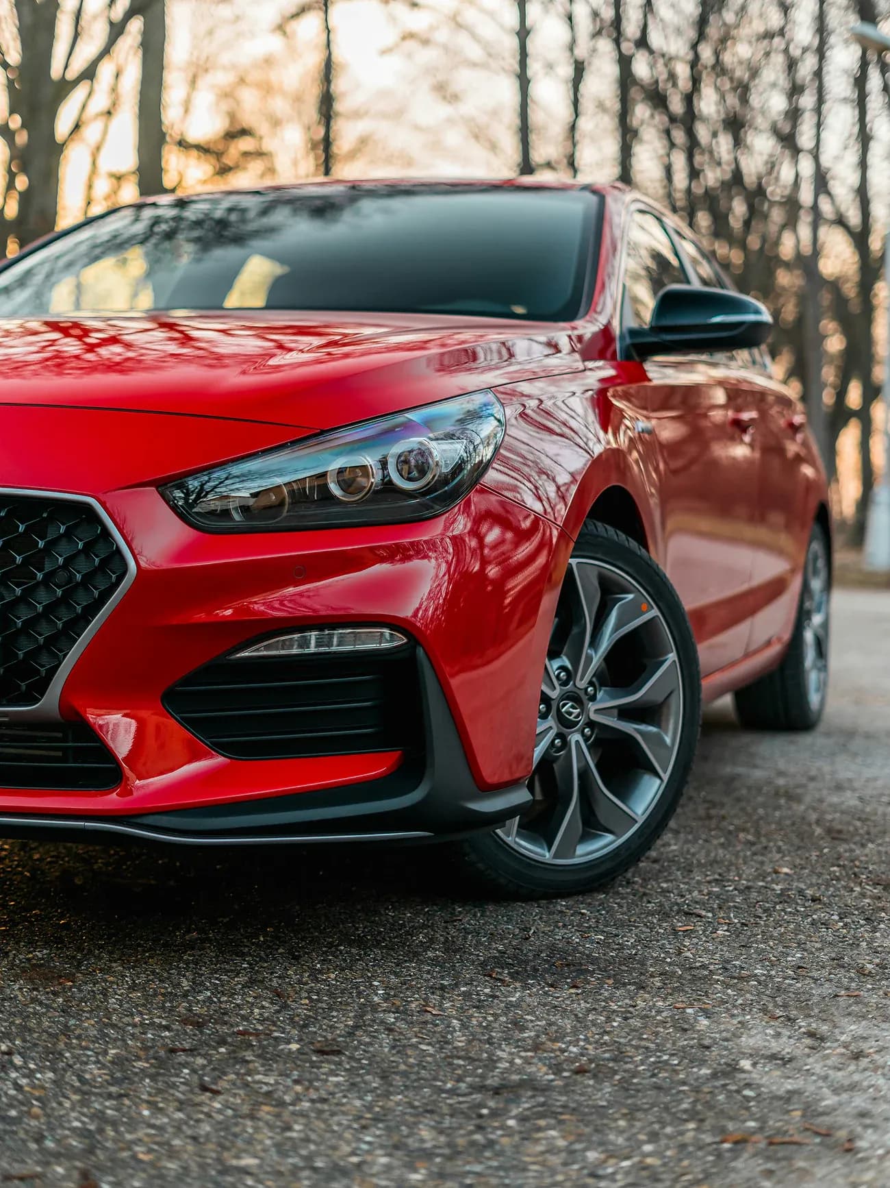 A red car parked outdoors